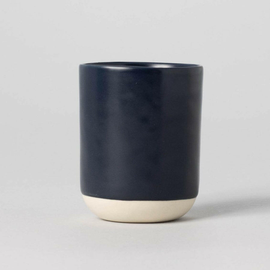 Elegant cappuccino served in a stylish ceramic cup showcasing refined coffee presentation