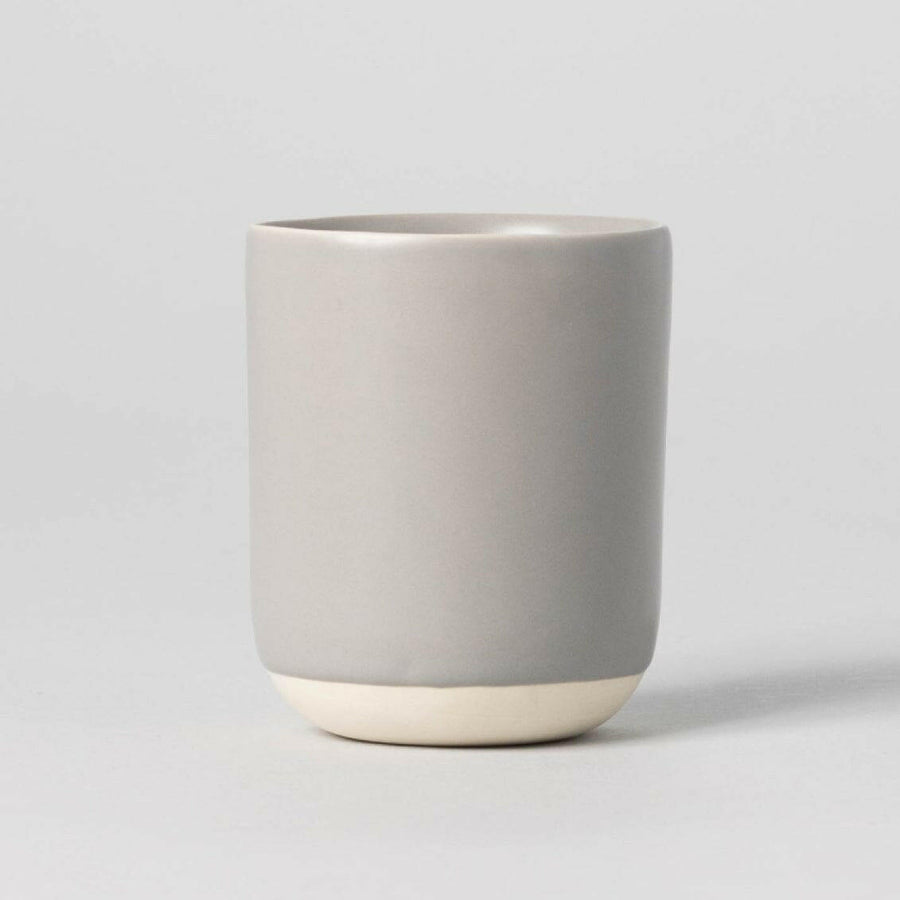 Elegant cappuccino served in a stylish ceramic cup showcasing refined coffee presentation