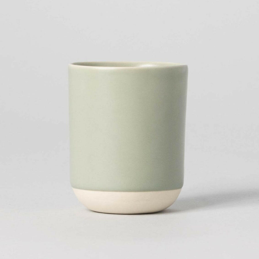 Elegant cappuccino served in a stylish ceramic cup showcasing refined coffee presentation