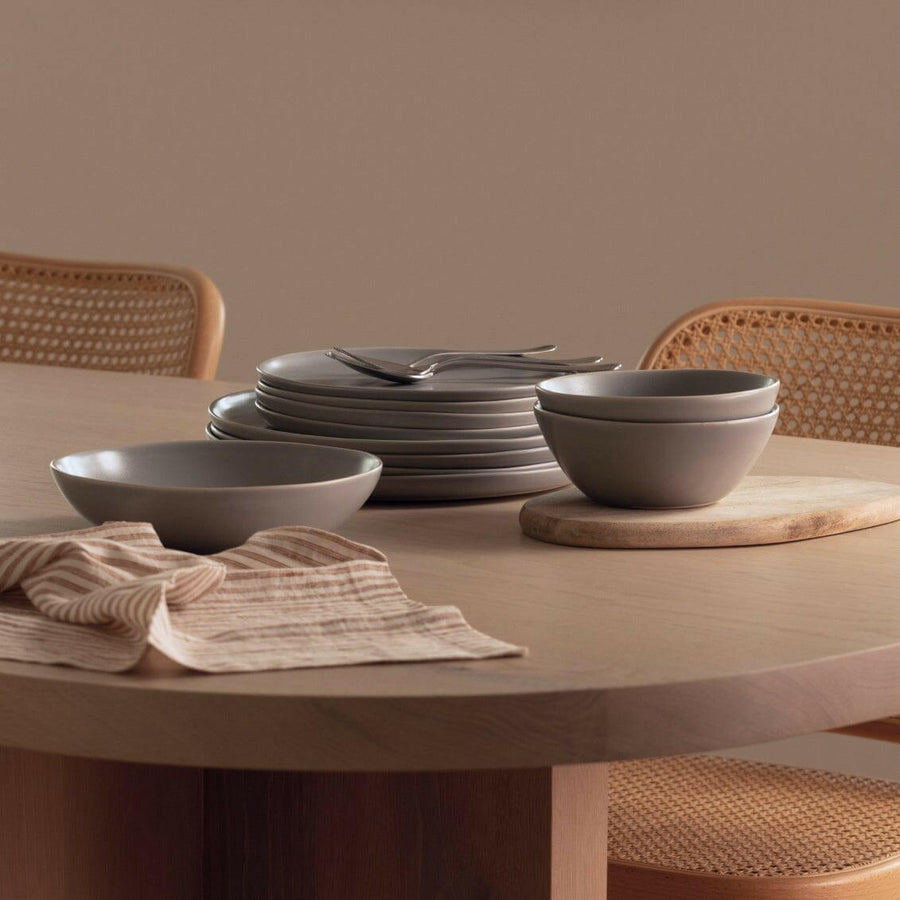 Elegant dinnerware set showcasing stylish plates and utensils perfect for formal dining occasions