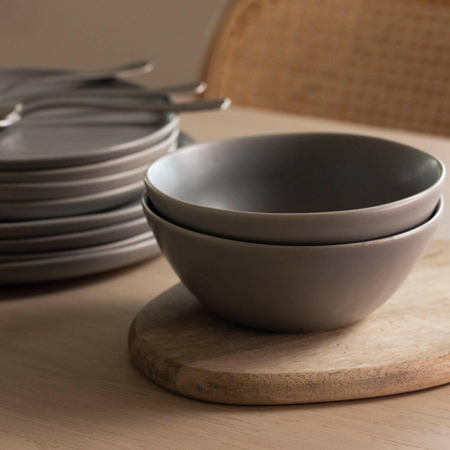 Elegant dinnerware set showcasing stylish plates and utensils perfect for formal dining occasions