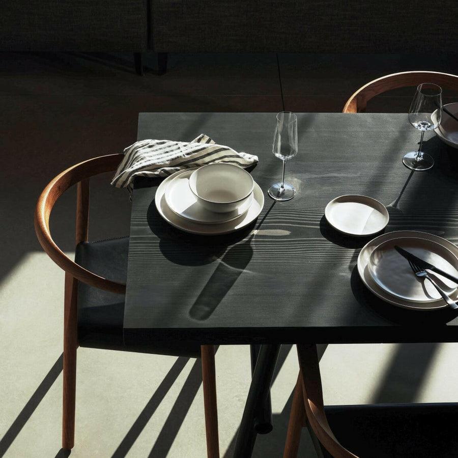 Elegant dinnerware set showcasing stylish plates and utensils perfect for formal dining occasions