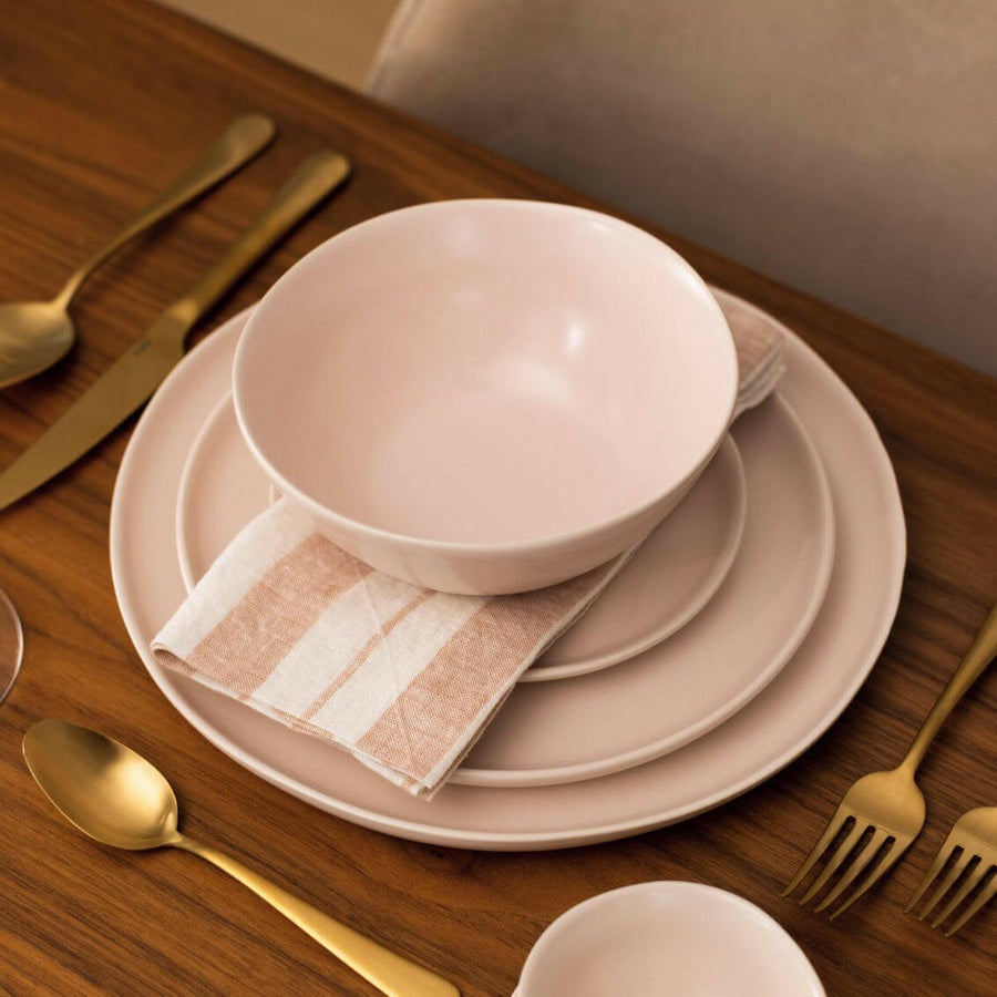 Elegant dinnerware set showcasing stylish plates and utensils perfect for formal dining occasions