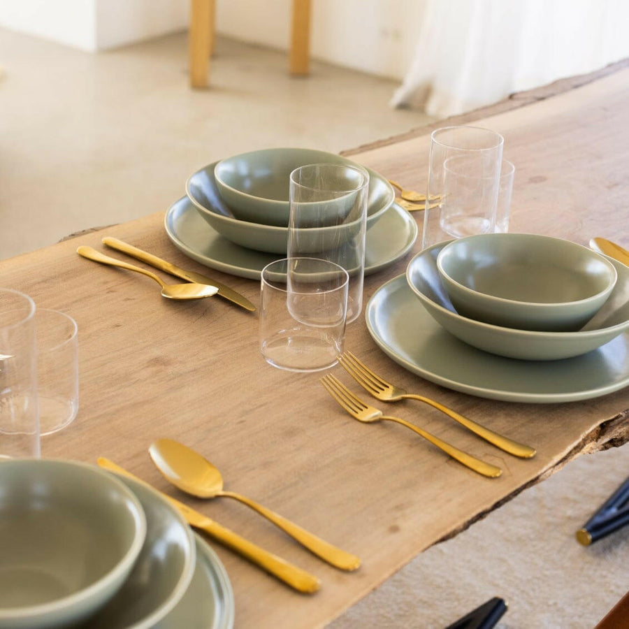 Elegant dinnerware set showcasing stylish plates and utensils perfect for formal dining occasions