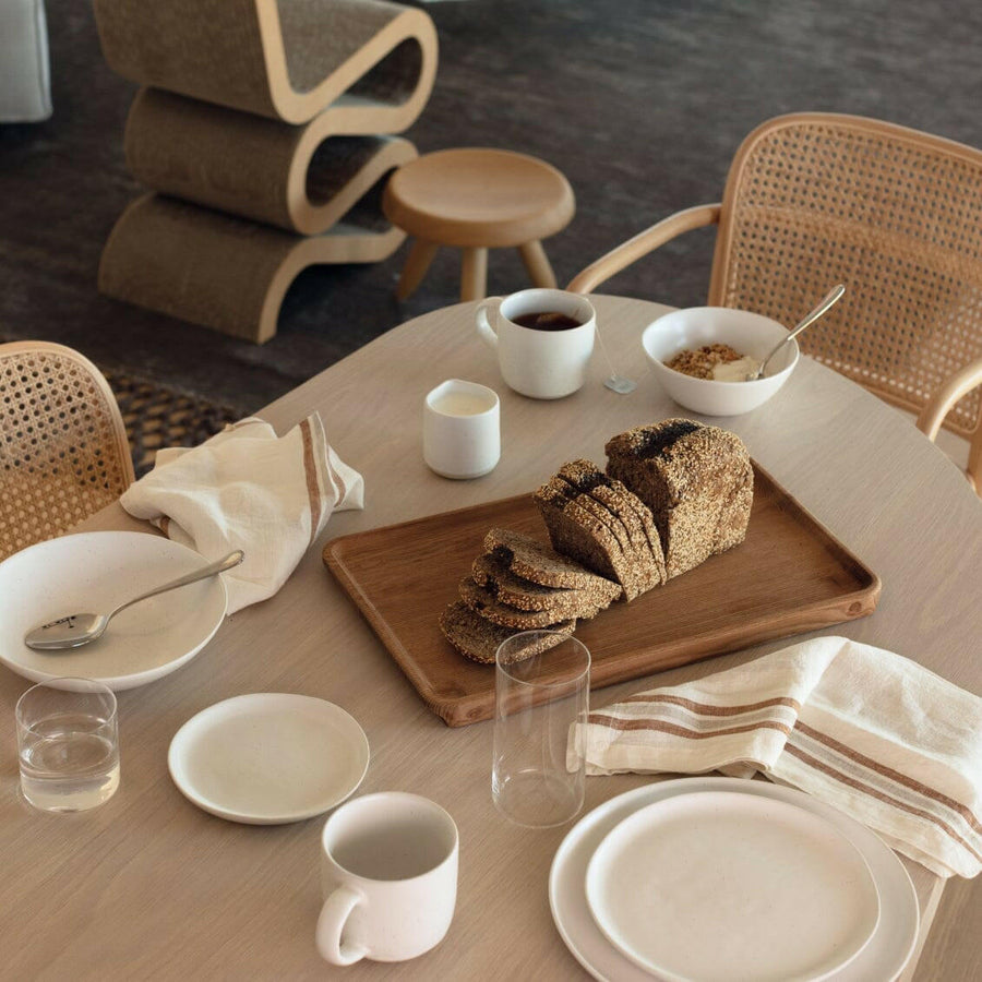 Elegant dinnerware set showcasing stylish plates and utensils perfect for formal dining occasions