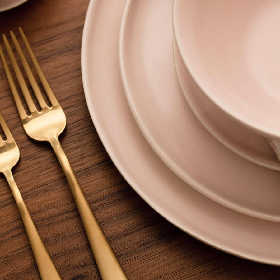 Elegant dinnerware set showcasing stylish plates and utensils perfect for formal dining occasions
