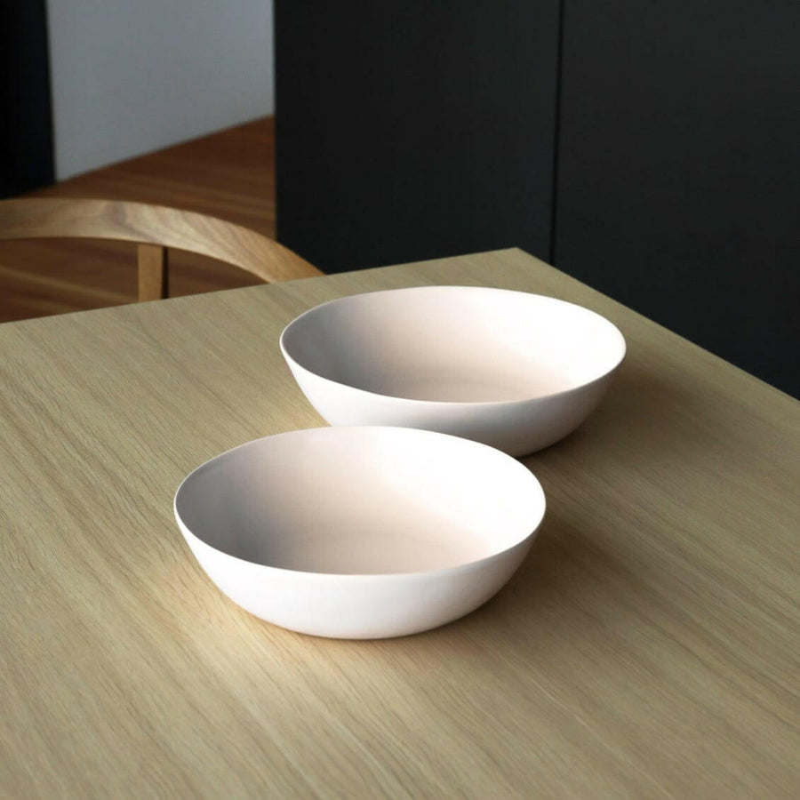 Elegant serving bowls showcasing exquisite design and craftsmanship, perfect for formal dining settings and sophisticated presentations.