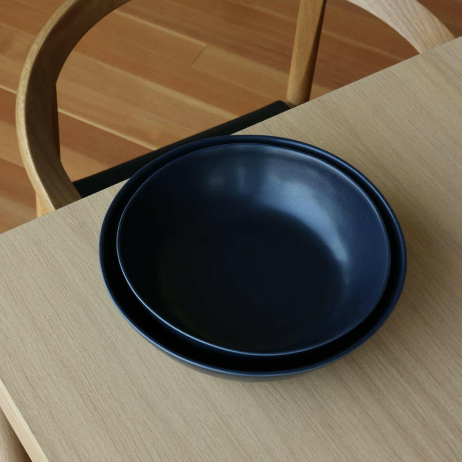 Elegant serving bowls showcasing exquisite design and craftsmanship, perfect for formal dining settings and sophisticated presentations.