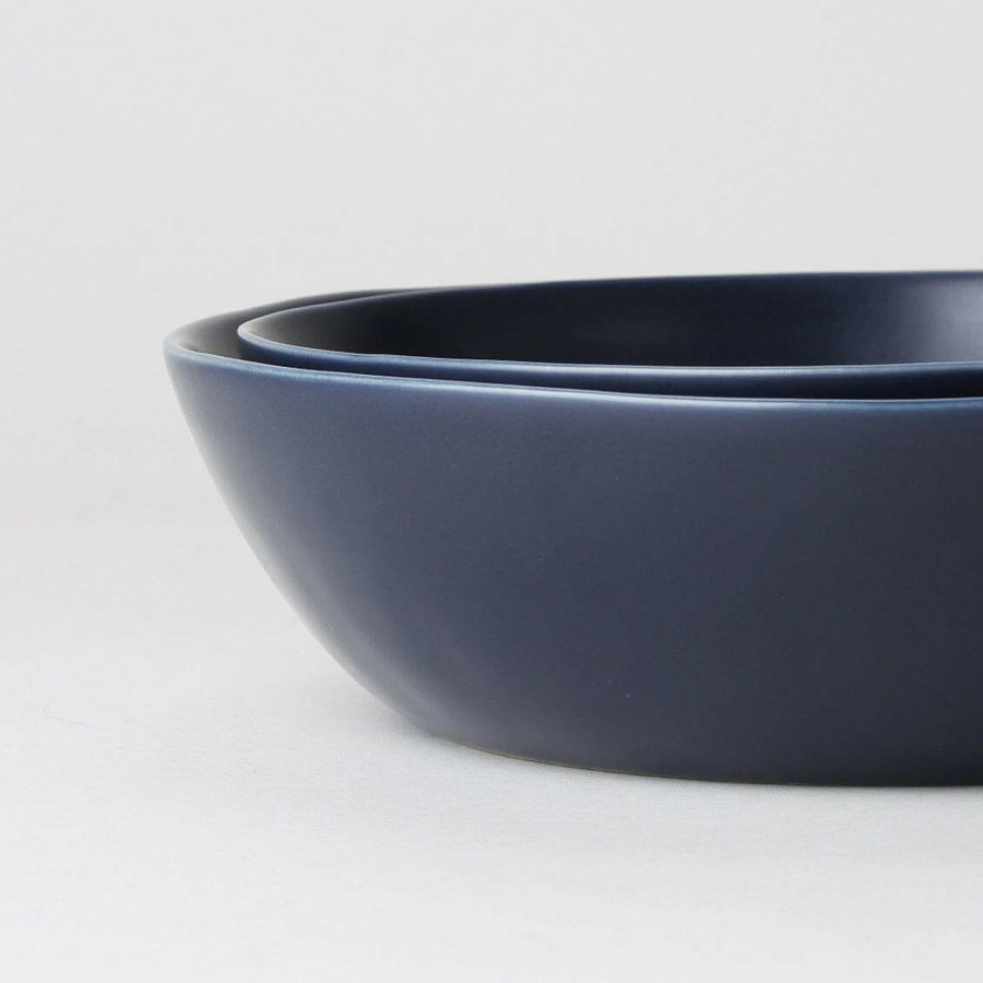 Elegant serving bowls showcasing exquisite design and craftsmanship, perfect for formal dining settings and sophisticated presentations.