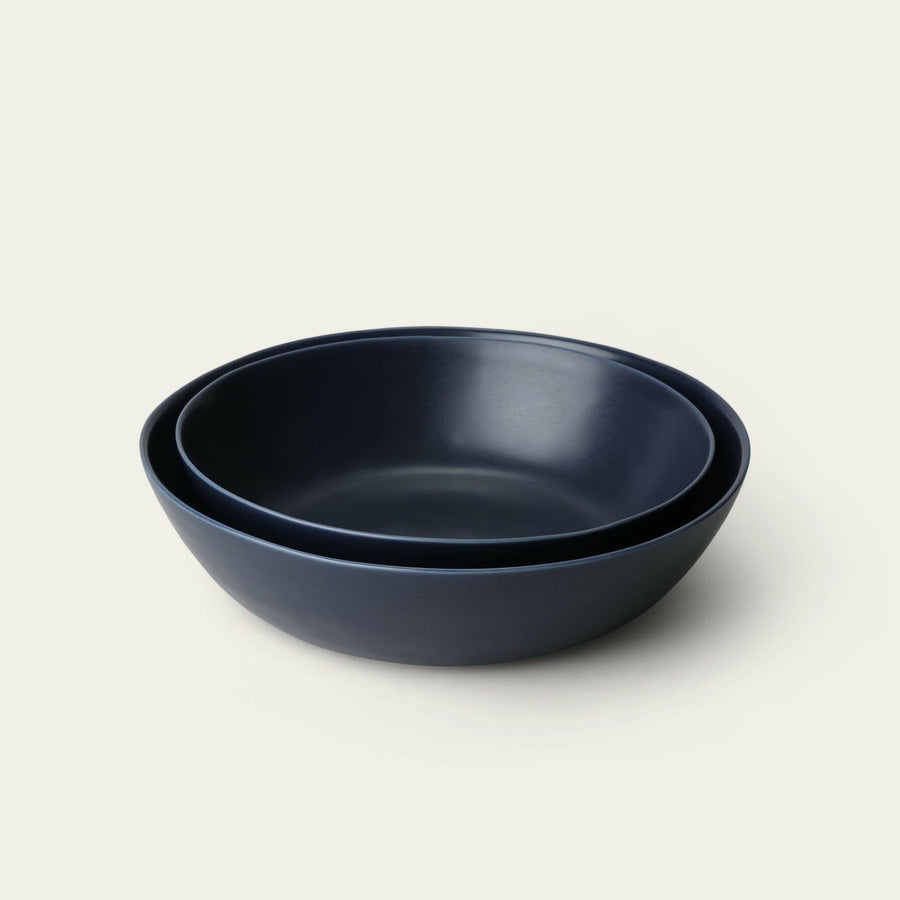 Elegant serving bowls showcasing exquisite design and craftsmanship, perfect for formal dining settings and sophisticated presentations.
