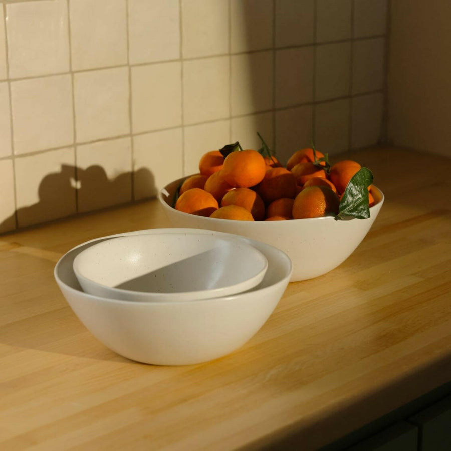 Nested serving bowls designed for space-saving storage, perfect for efficient kitchen organization and elegant table settings.