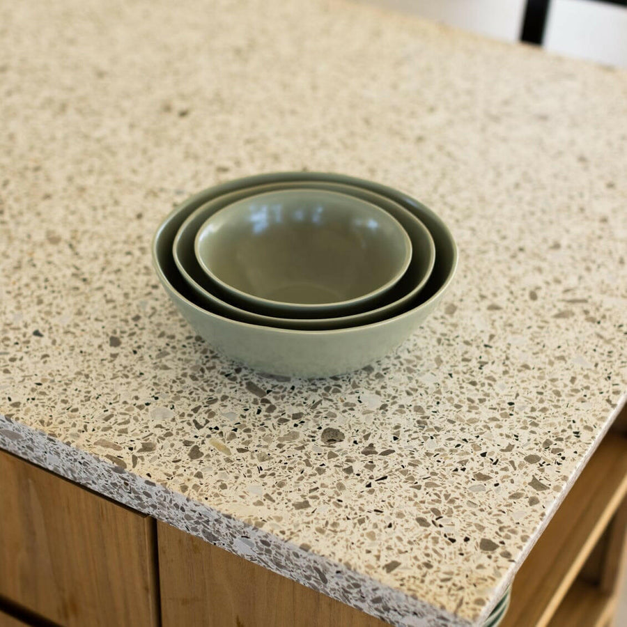 Nested serving bowls designed for space-saving storage, perfect for efficient kitchen organization and elegant table settings.