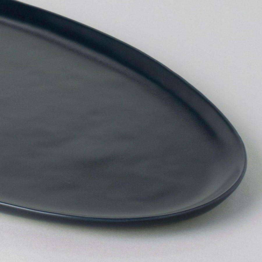 Elegant serving platter showcasing exquisite craftsmanship, perfect for formal dining and sophisticated presentations.