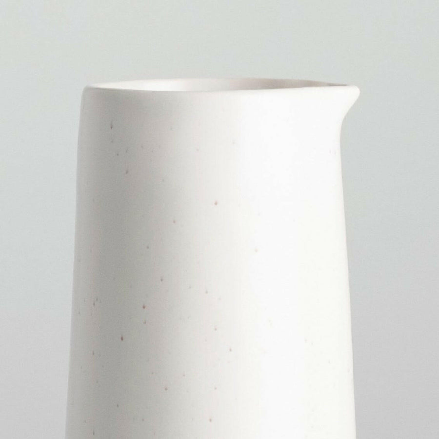 Elegant glass carafe showcasing refined craftsmanship and sophisticated design, perfect for stylish beverage presentation.