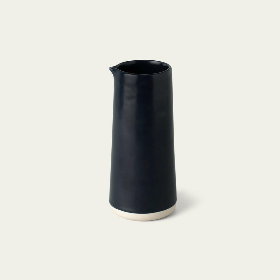 Elegant glass carafe showcasing refined craftsmanship and sophisticated design, perfect for stylish beverage presentation.
