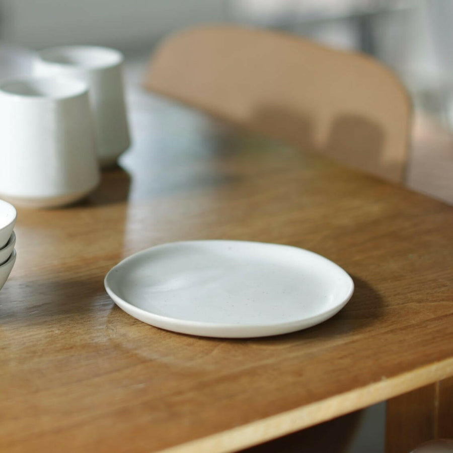 Elegant dessert plates displayed on a fine dining table, perfect for sophisticated event settings and upscale celebrations.