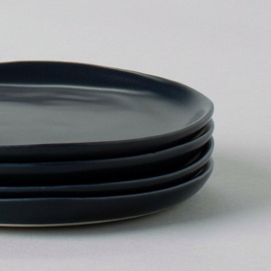 Elegant dessert plates displayed on a fine dining table, perfect for sophisticated event settings and upscale celebrations.