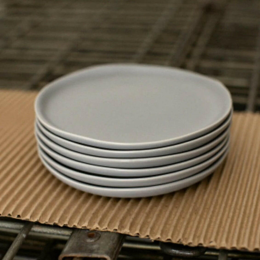 Elegant dessert plates displayed on a fine dining table, perfect for sophisticated event settings and upscale celebrations.