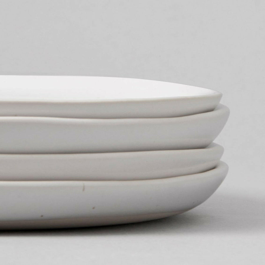 Elegant dessert plates displayed on a fine dining table, perfect for sophisticated event settings and upscale celebrations.