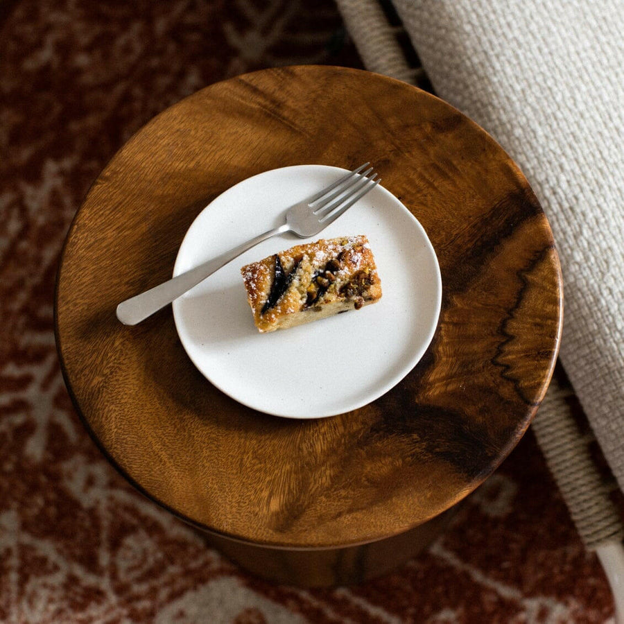 Elegant dessert plates displayed on a fine dining table, perfect for sophisticated event settings and upscale celebrations.