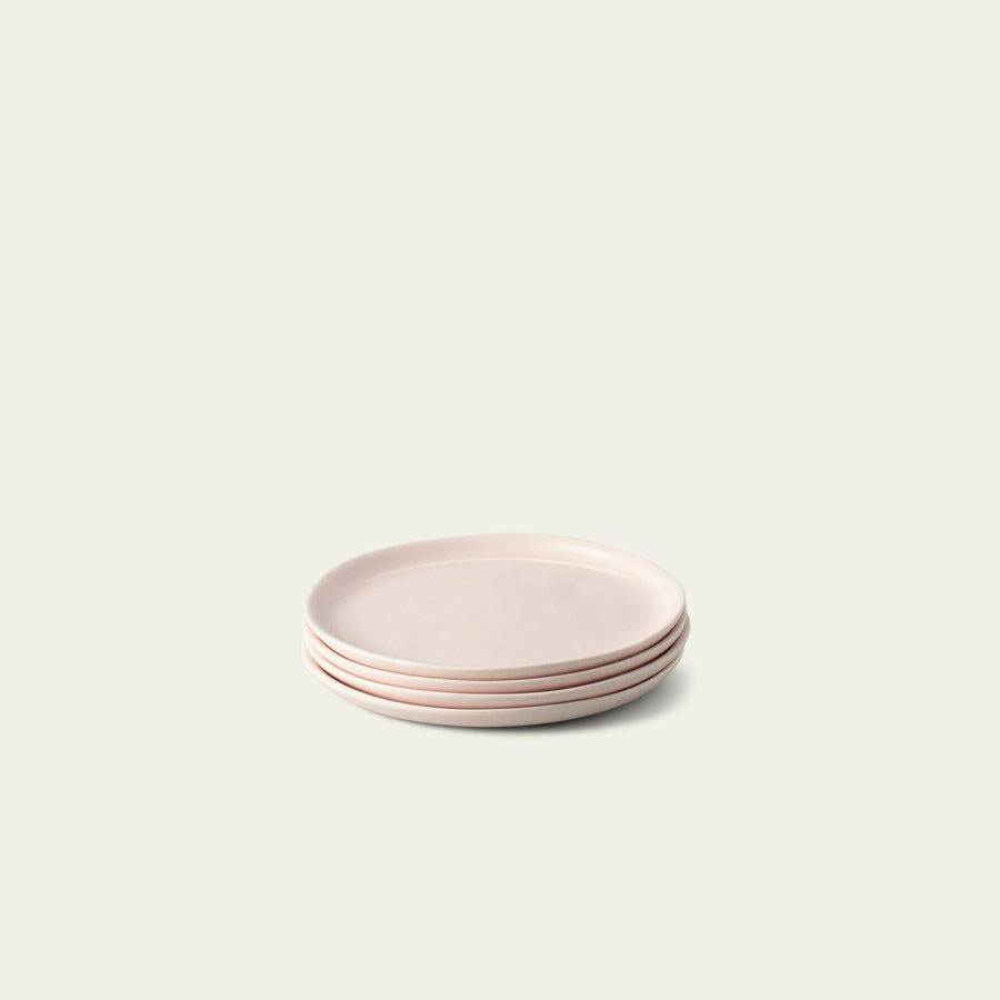 Elegant dessert plates displayed on a fine dining table, perfect for sophisticated event settings and upscale celebrations.