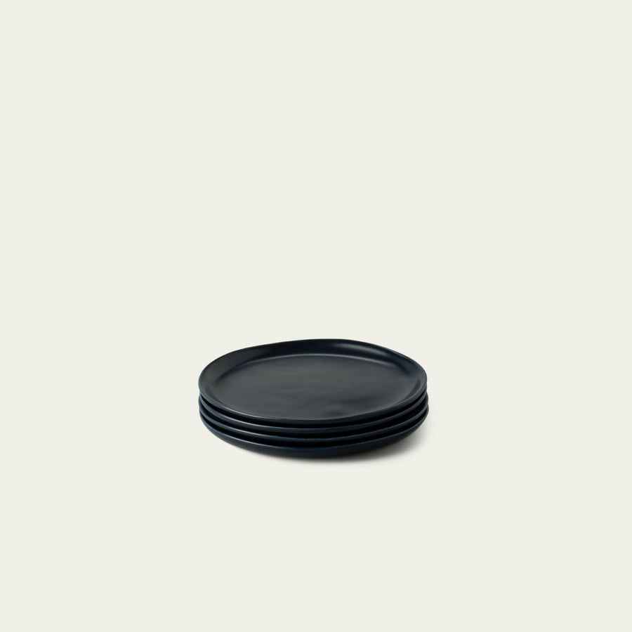Elegant dessert plates displayed on a fine dining table, perfect for sophisticated event settings and upscale celebrations.