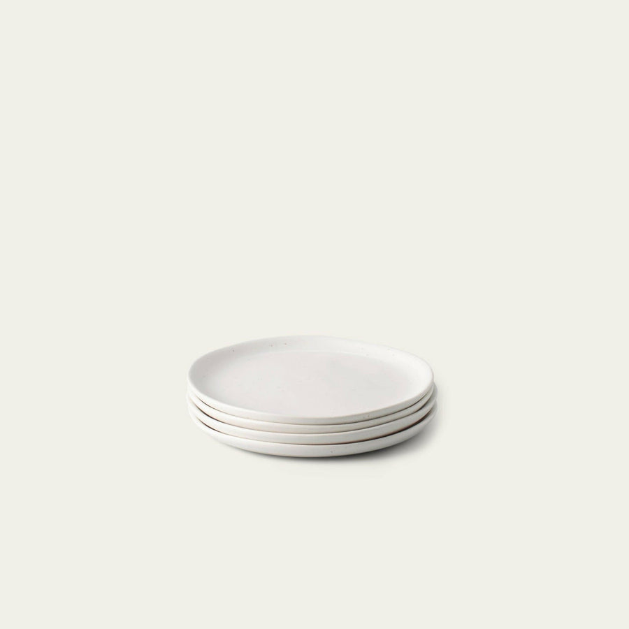 Elegant dessert plates displayed on a fine dining table, perfect for sophisticated event settings and upscale celebrations.