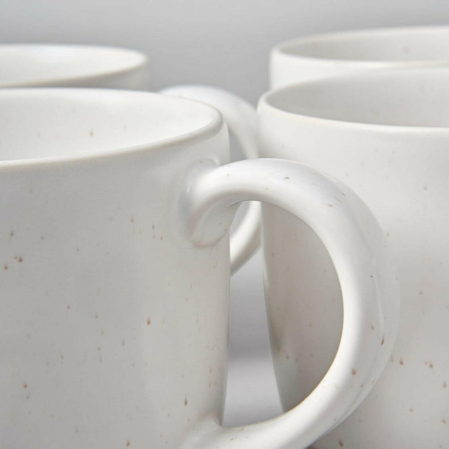 Vibrant Mugs by Vesselio showcasing colorful and elegant drinkware perfect for any occasion