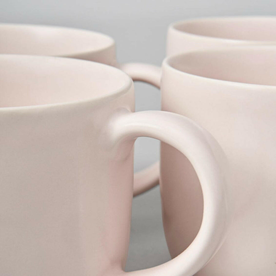 Vibrant Mugs by Vesselio showcasing colorful and elegant drinkware perfect for any occasion