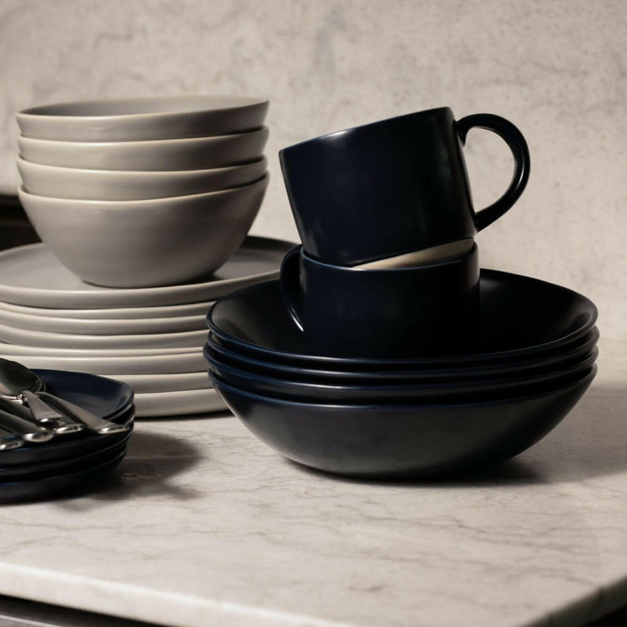 Elegant pasta bowls set on a dining table, showcasing sleek design and premium quality for sophisticated meals.