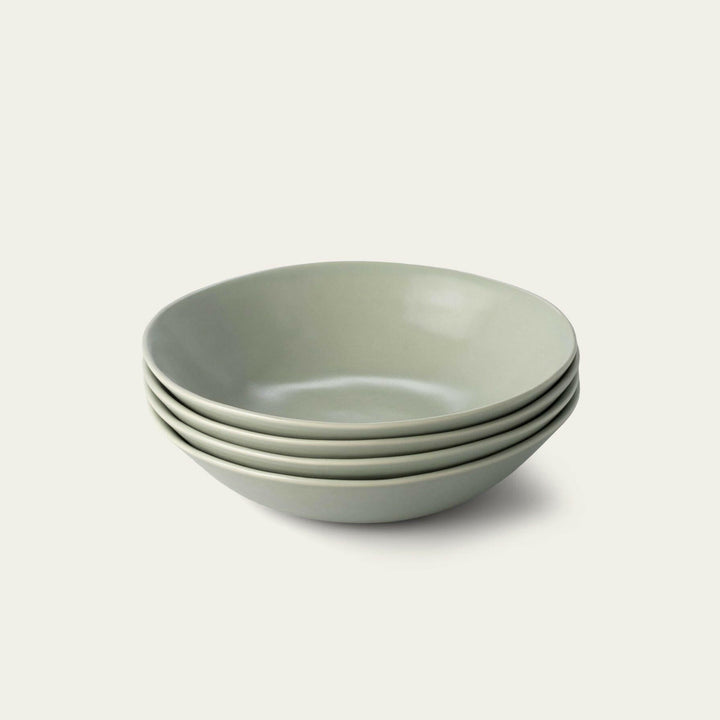 Elegant pasta bowls set on a dining table, showcasing sleek design and premium quality for sophisticated meals.