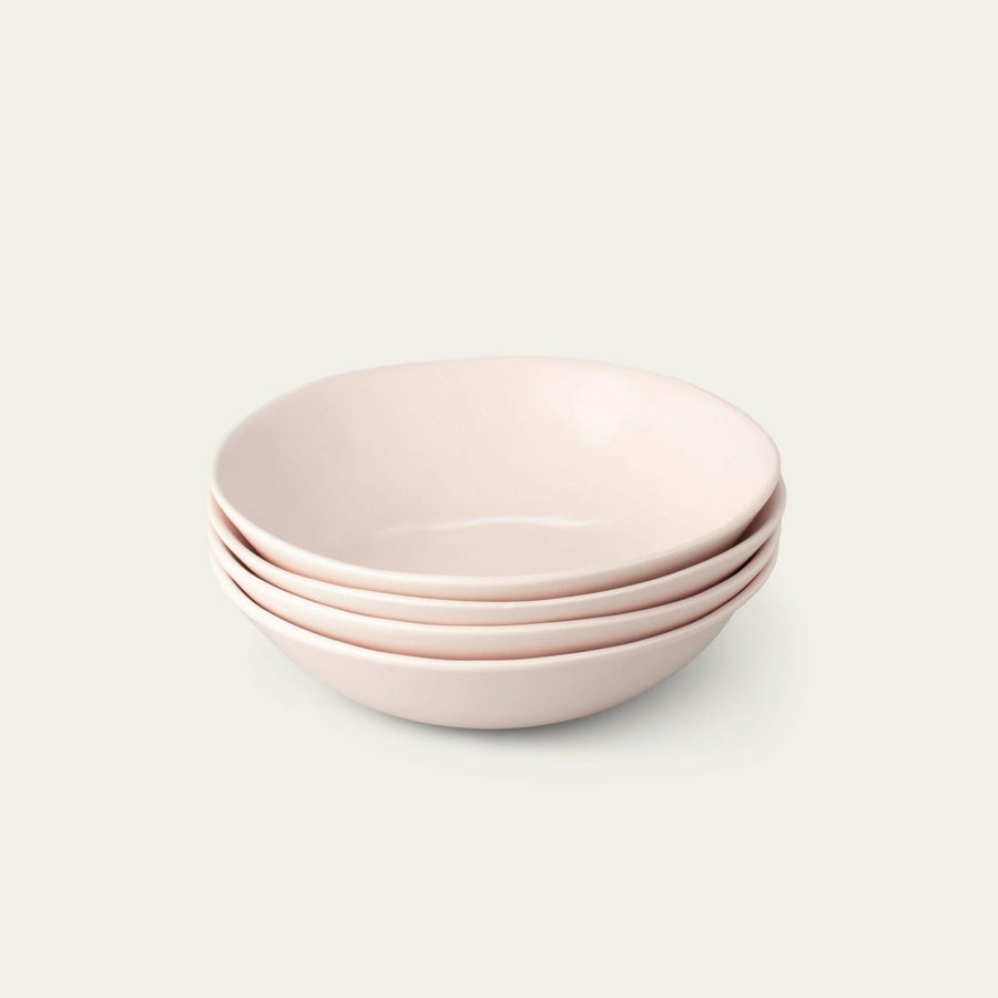 Elegant pasta bowls set on a dining table, showcasing sleek design and premium quality for sophisticated meals.