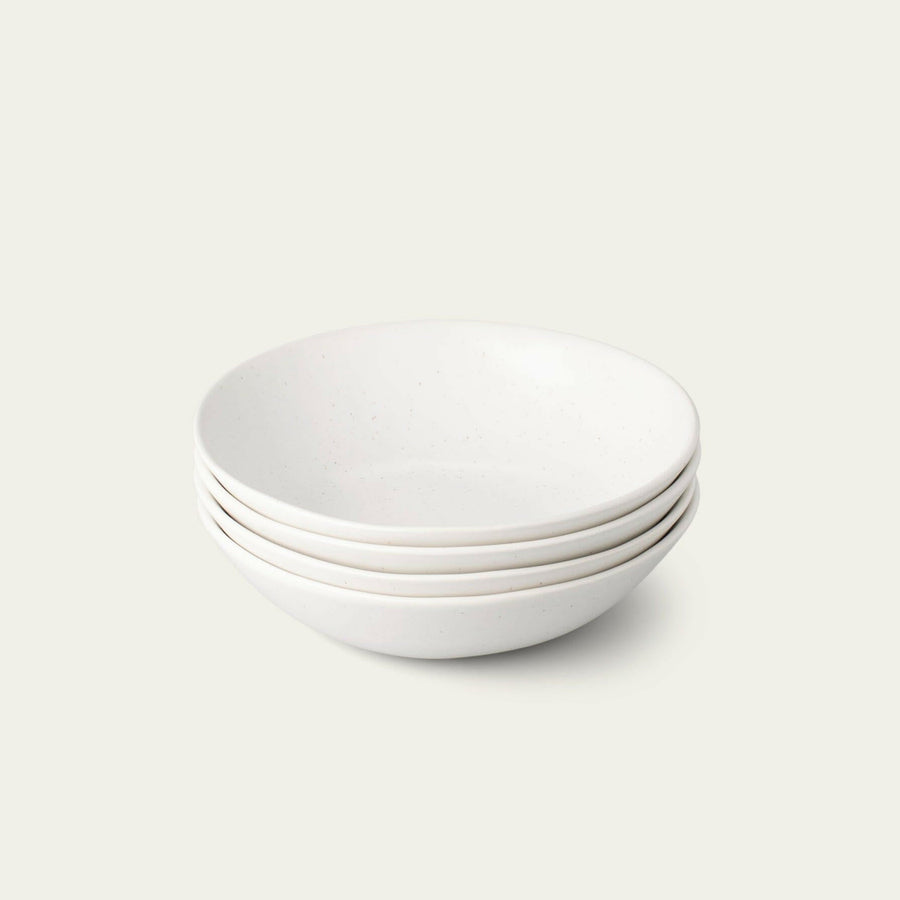 Elegant pasta bowls set on a dining table, showcasing sleek design and premium quality for sophisticated meals.